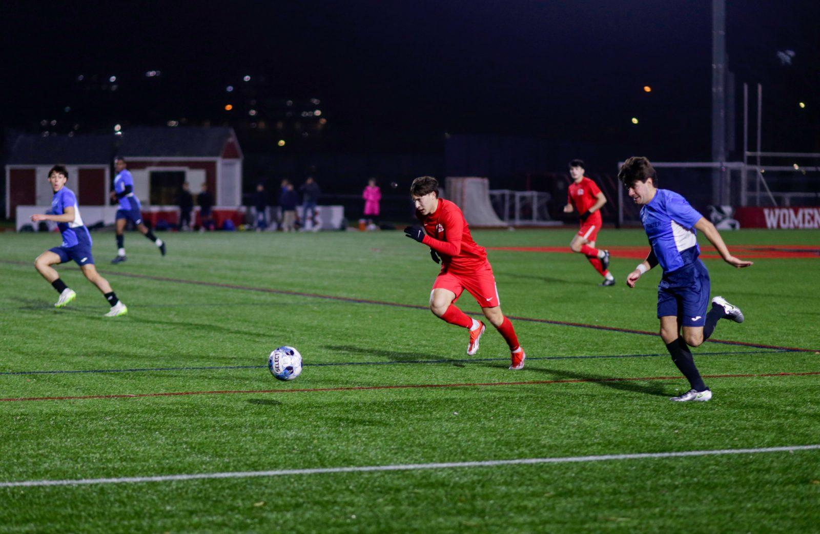 Freshman David Gonzalez chases after the ball at a game against Falcons FC Wednesday. The Boston University men’s club soccer team is preparing for the fifth semi-annual club soccer Boston Beanpot, hoping to build on their recent success. JOSIE KALBFLEISCH/DFP PHOTOGRAPHER