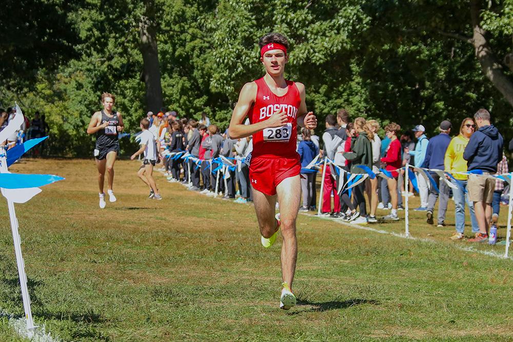 Junior Will Loggia running in a meet at the 2022 Coast-to-Coast Battle in Beantown. The men’s and women’s cross country teams will be competing at the NCAA Northeast Regional Championship on Nov. 11. ELIZA NUESTRO/DFP STAFF
