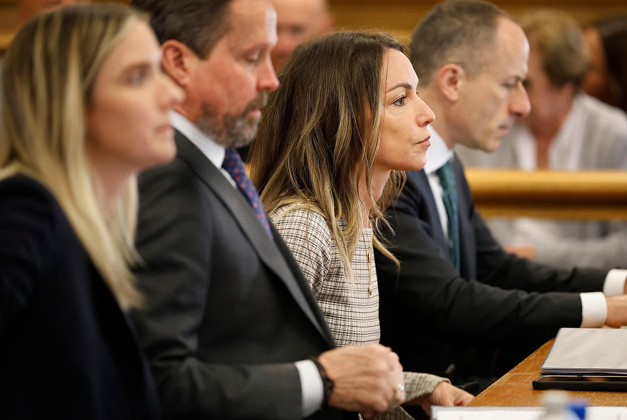 Karen Read, center, sits at the defense table with her lawyers during her murder trial at Norfolk Superior Court in Dedham, Massachusetts, on Wednesday, May 7, 2025.