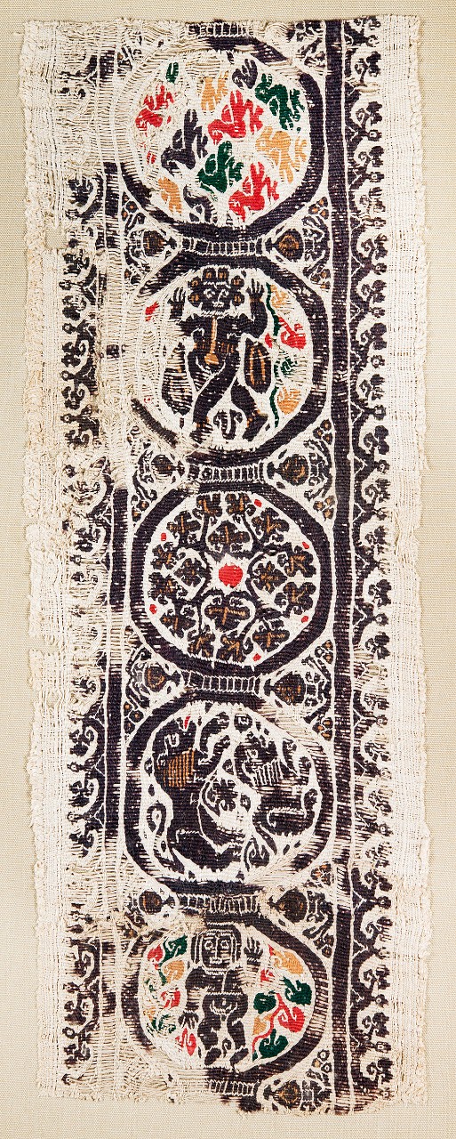 Textile band with roundels filled with lions, birds, foliage, dancers Egypt, 5th–6th century CE wool on undyed linen, 19.3 x 7 in. Textile band with roundels filled with lions, birds, foliage, dancers Egypt, 5th–6th century CE wool on undyed linen, 19.3 x 7 in.