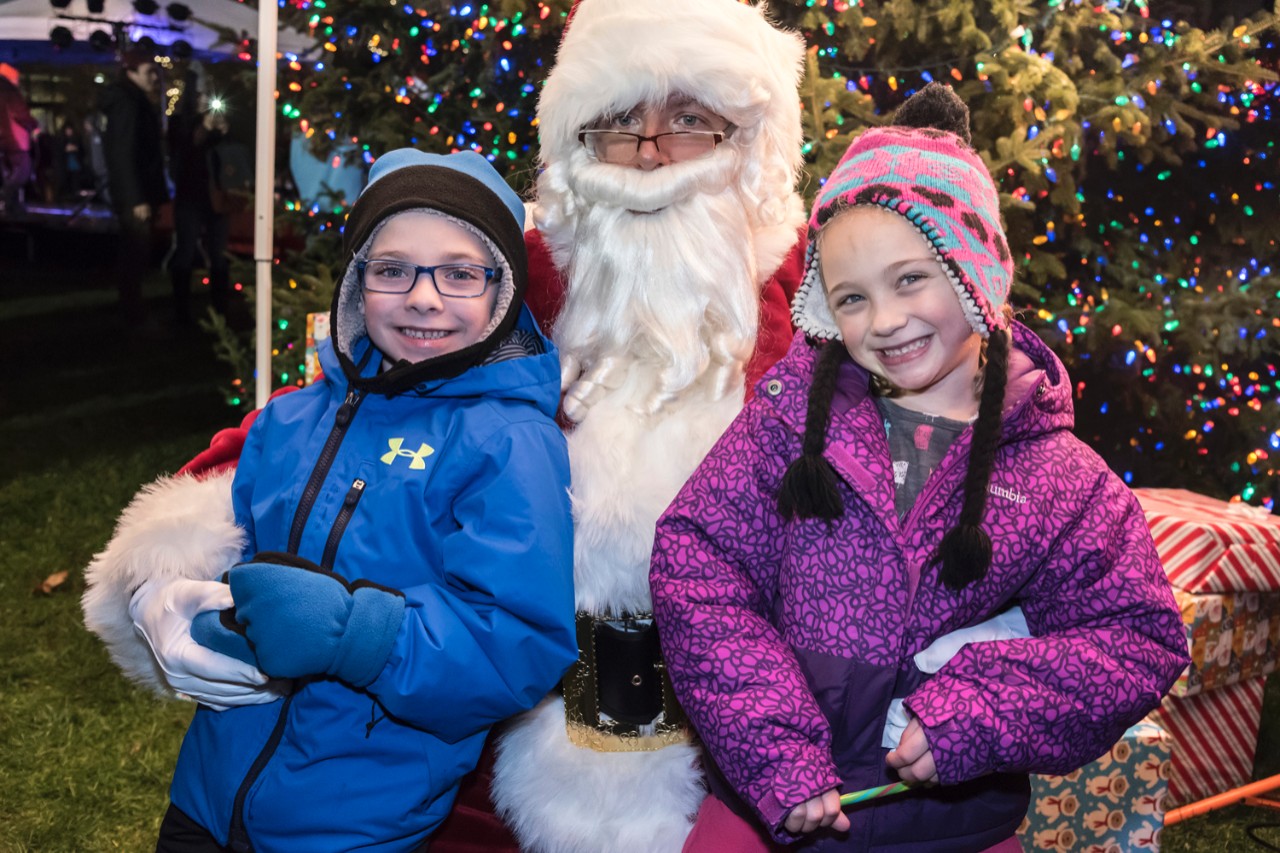Young visitors with Santa. Young visitors with Santa.