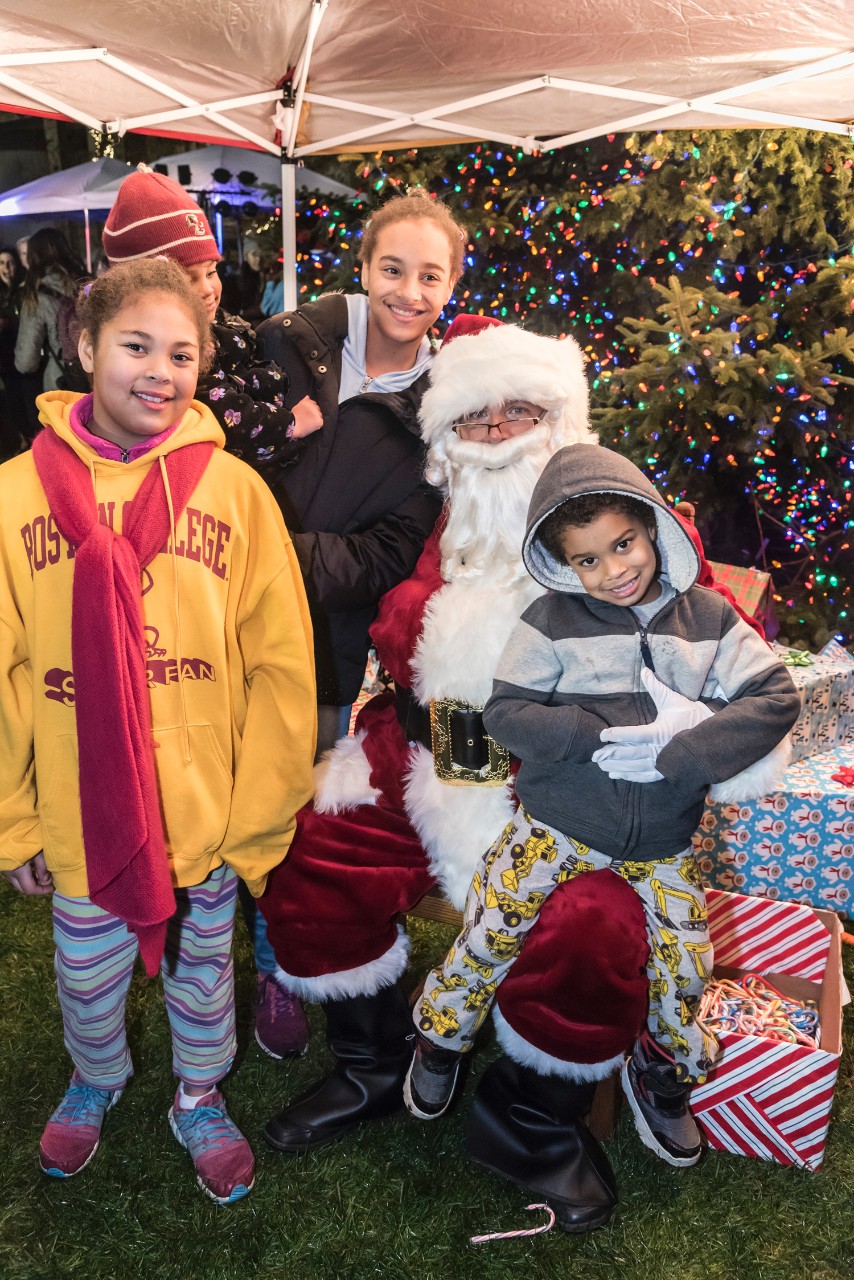 Young visitors with Santa. Young visitors with Santa.