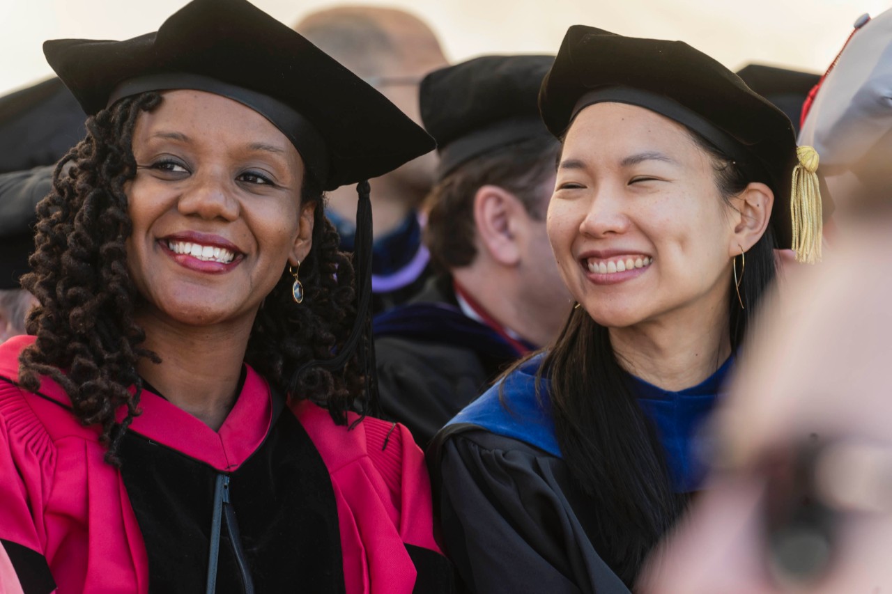 Smiling graduates Smiling graduates