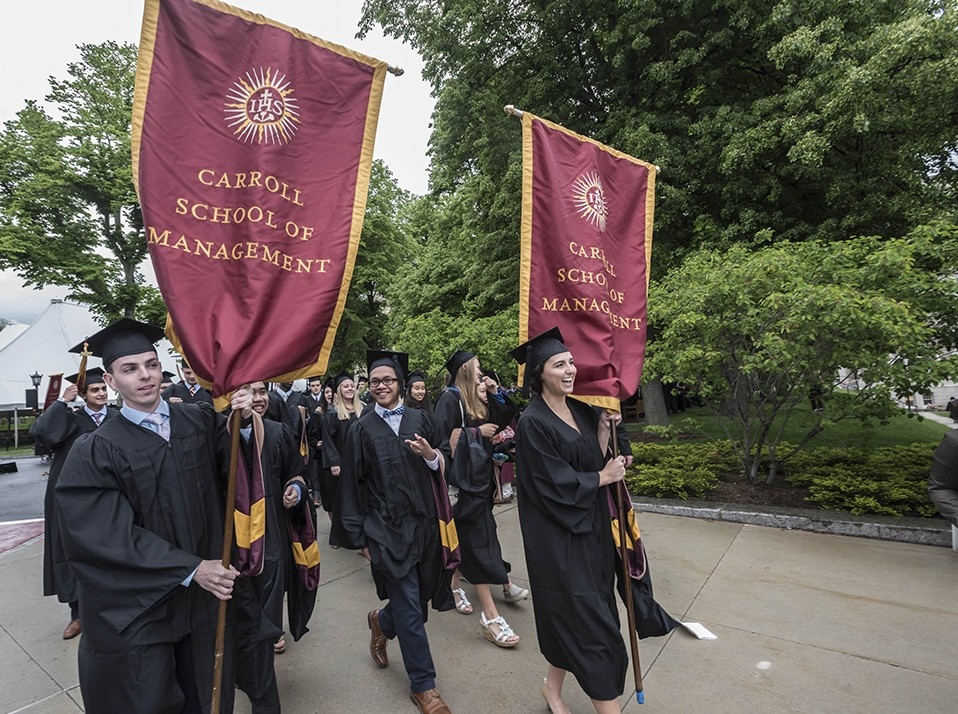 The graduating class gathered on Linden Lane before processing to the main Commencement ceremony in Alumni Stadium. The graduating class gathered on Linden Lane before processing to the main Commencement ceremony in Alumni Stadium.