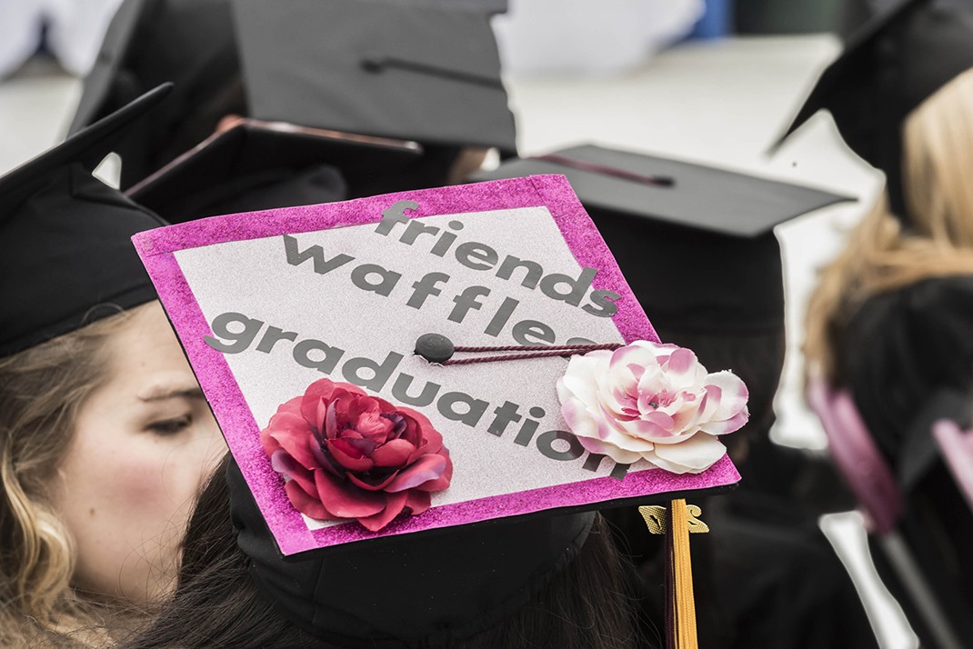 Mortarboard reads 'friends, waffles, graduation' Mortarboard reads 'friends, waffles, graduation'