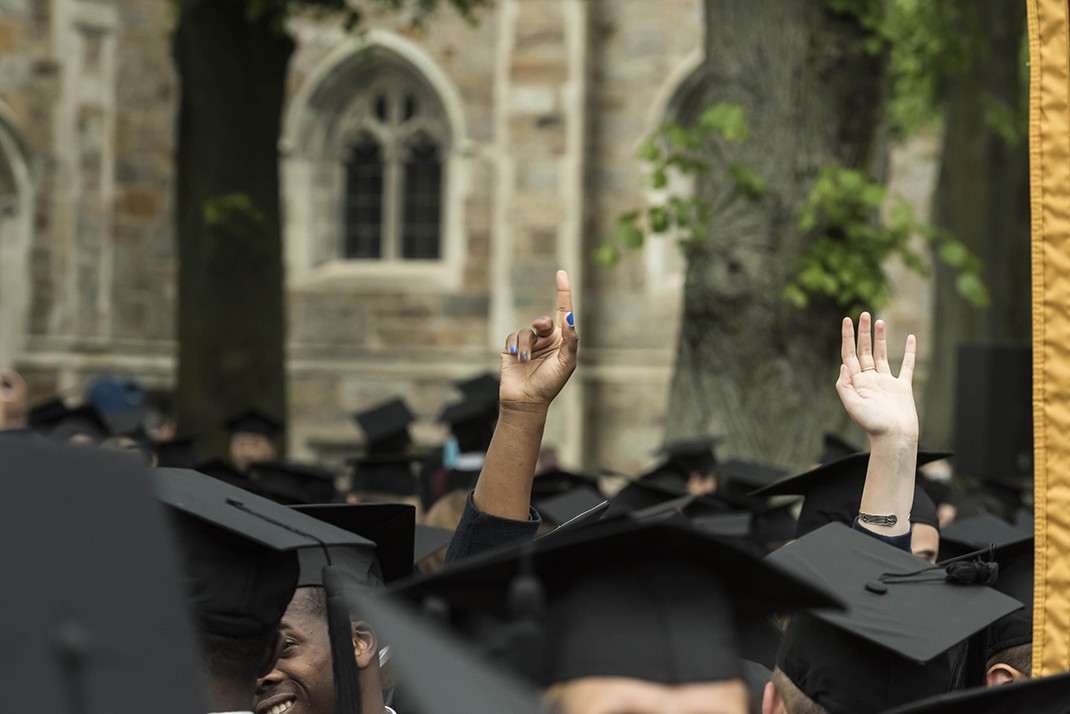 The graduating class gathered on Linden Lane before processing to the main Commencement ceremony in Alumni Stadium. The graduating class gathered on Linden Lane before processing to the main Commencement ceremony in Alumni Stadium.
