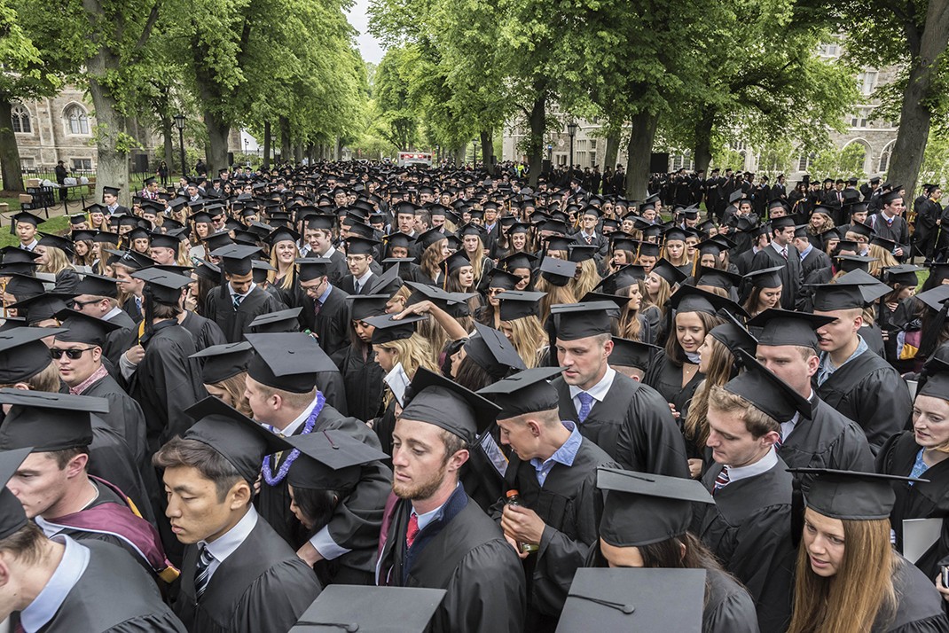 The graduating class gathered on Linden Lane before processing to the main Commencement ceremony in Alumni Stadium. The graduating class gathered on Linden Lane before processing to the main Commencement ceremony in Alumni Stadium.