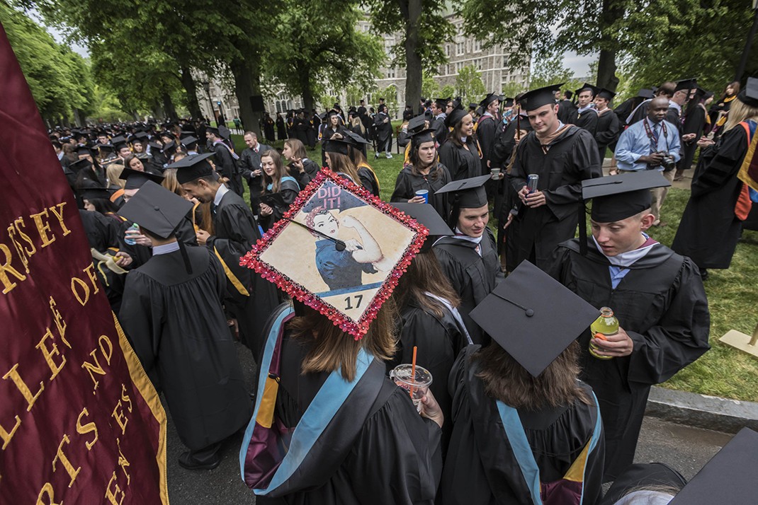 The graduating class gathered on Linden Lane before processing to the main Commencement ceremony in Alumni Stadium. The graduating class gathered on Linden Lane before processing to the main Commencement ceremony in Alumni Stadium.