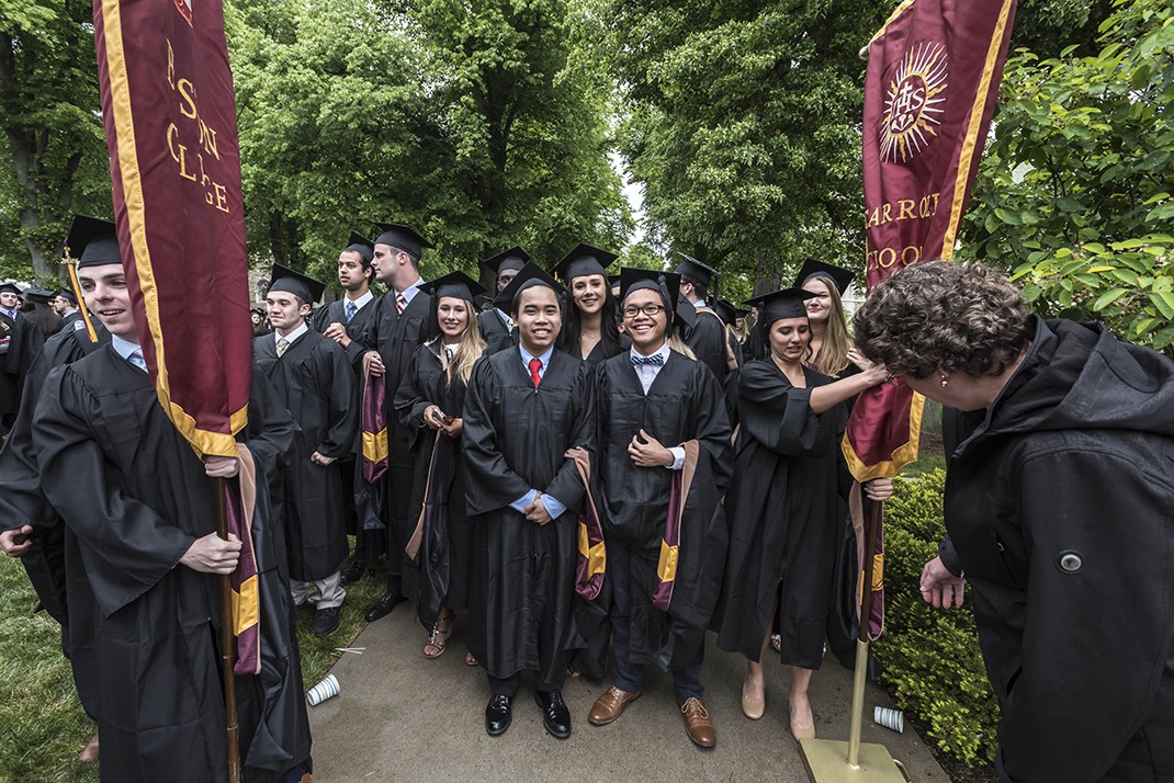 The graduating class gathered on Linden Lane before processing to the main Commencement ceremony in Alumni Stadium. The graduating class gathered on Linden Lane before processing to the main Commencement ceremony in Alumni Stadium.