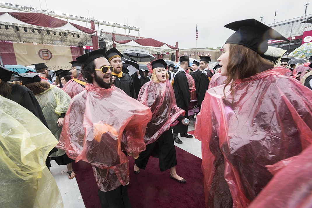 Graduates in rain ponchos Graduates in rain ponchos