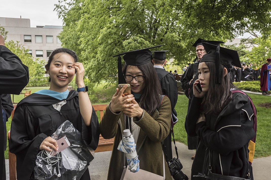 The graduating class gathered on Linden Lane before processing to the main Commencement ceremony in Alumni Stadium. The graduating class gathered on Linden Lane before processing to the main Commencement ceremony in Alumni Stadium.