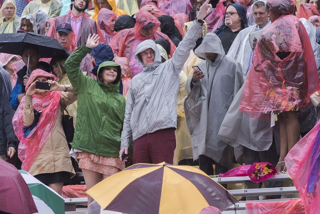 Scene from Alumni Stadium at BC Commencement; family members and friends in rain ponchos Scene from Alumni Stadium at BC Commencement; family members and friends in rain ponchos