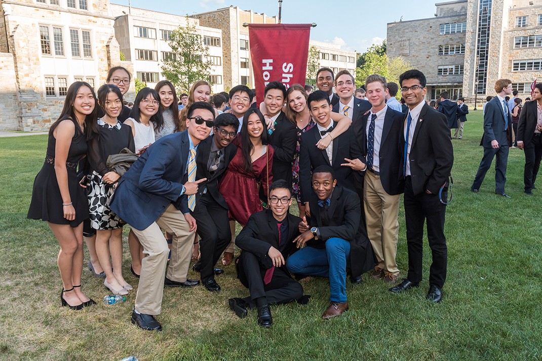 Members of the Class of 2021 precede the event with a few photographs. Members of the Class of 2021 precede the event with a few photographs.