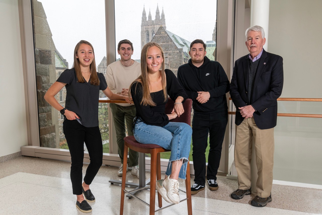 Seniors Ella Whitman, Michael Britt, and Naomi Alter, junior Sebastian Cota, and Philip Landrigan, M.D.