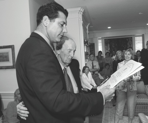 John McManama '37, MD, receiving a citation from Massachusetts Rep. Peter Koutoujian at a 2006 Boston College reception honoring Dr. McManama – who had recently turned 90 – for his years of work with University Health Services. John McManama '37, MD, receiving a citation from Massachusetts Rep. Peter Koutoujian at a 2006 Boston College reception honoring Dr. McManama – who had recently turned 90 – for his years of work with University Health Services.