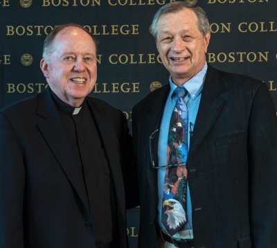 University President William P. Leahy, S.J., with Associate Professor of Sociology Michael Malec, at the presentation of BC's 2016 Community Service Award. (Photo by Lee Pellegrini) University President William P. Leahy, S.J., with Associate Professor of Sociology Michael Malec, at the presentation of BC's 2016 Community Service Award. (Photo by Lee Pellegrini)