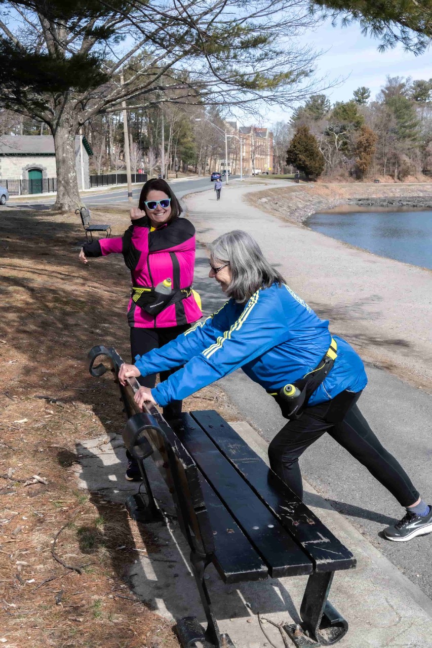 the McManus mother and daughter stretching before a run