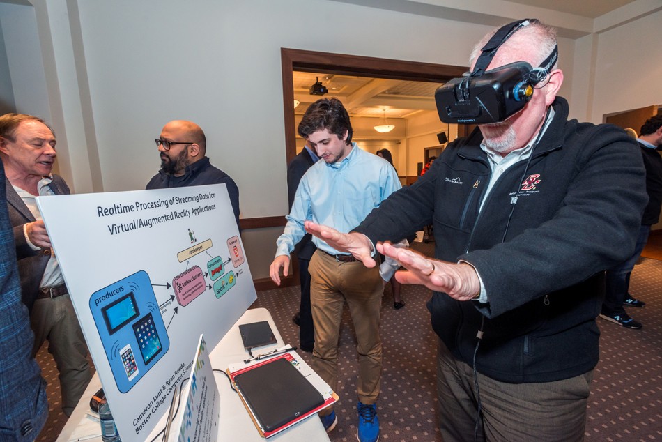 Students Cameron Lunt '17 and Ryan Reede '16 present their research project on realtime processing of streaming data for virtual/augmented reality application. Students Cameron Lunt '17 and Ryan Reede '16 present their research project on realtime processing of streaming data for virtual/augmented reality application.