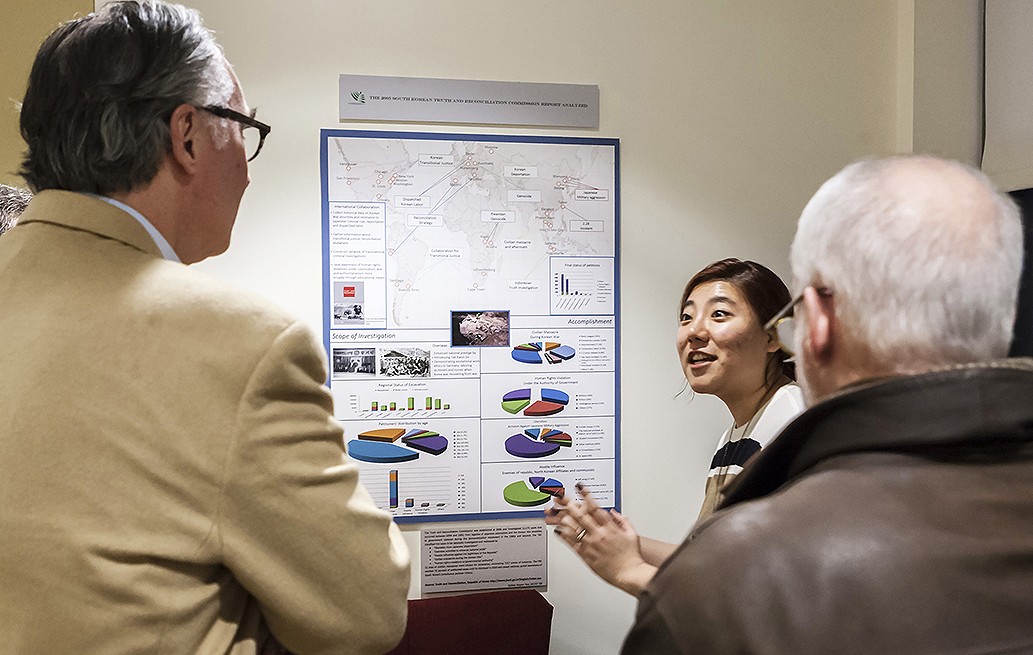MSuhee Vesper Yun '18, above, and George Boateng '18 described their projects at the opening of "Righting Historical Wrongs at the Turn of the Millennium," the latest exhibit in the "Making History Public" series.aking History Public Suhee Vesper Yun '18, above, and George Boateng '18 described their projects at the opening of "Righting Historical Wrongs at the Turn of the Millennium," the latest exhibit in the "Making History Public" series.