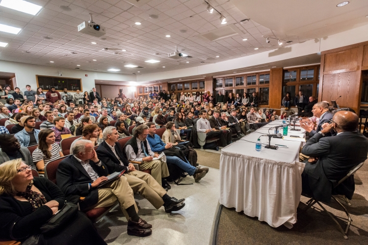 Scene of standing-room-only crowd in the Fulton Hall classroom