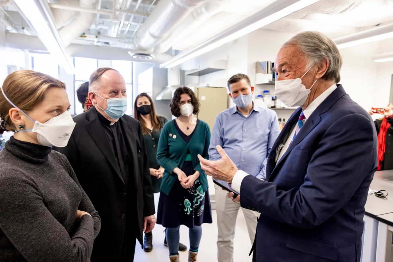 U.S. Senator Edward Markey (far right) announced the grant at a campus event on March 29. Shown above, l-r: Earth and Environmental Sciences doctoral student Meg Yoder; master's student Jose Cuevas; Boston College President William P. Leahy, S.J.: postdoctoral scholar Kristen Fogaren; Assistant Professor Hilary Palevsky; and Professor and Chair Ethan Baxter.