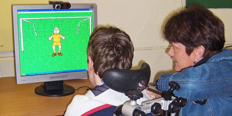 Patrick from The School of the Divine Child in Cork, Ireland pictured with Maureen Gates (recently retired from the Campus School), who was at the school to do a Camera Mouse training session. Patrick from The School of the Divine Child in Cork, Ireland pictured with Maureen Gates (recently retired from the Campus School), who was at the school to do a Camera Mouse training session.