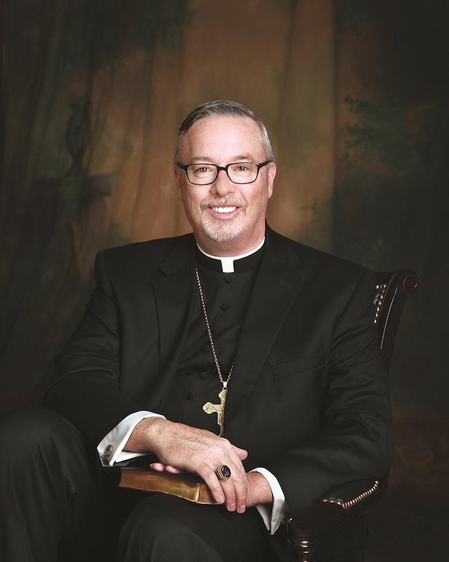 Headshot of Christopher Coyne