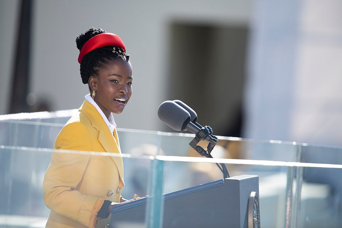 Amanda Gorman reciting "The Hill We Climb" poem at the 2021 Biden inauguration