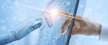 screenshot of robot hand touching human hand