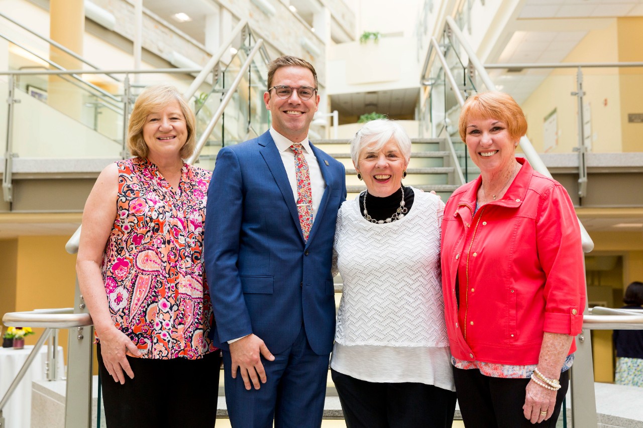John Welch with past recipients of the Dean Rita P. Kelleher Award