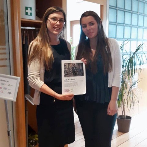Haley Walker '20 and her supervisor at Oxfam International present a paper on providing aid to Syria. Haley interned at Oxfam International while studying abroad in Geneva, Switzerland in Fall 2019.
