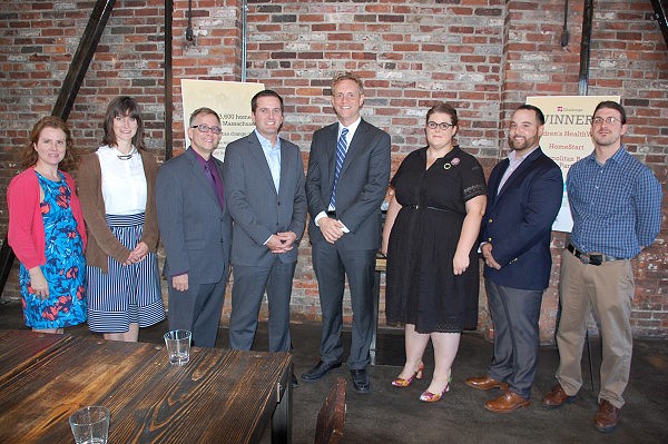 Representatives from the three winning organizations