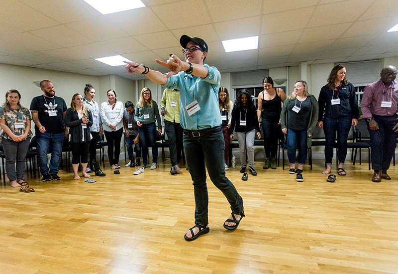 Claire Geruson leads an ice breaker activity