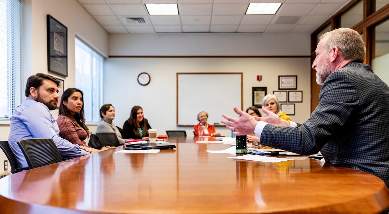 The PUC team meet with staff working in area interdisciplinary law clinics.