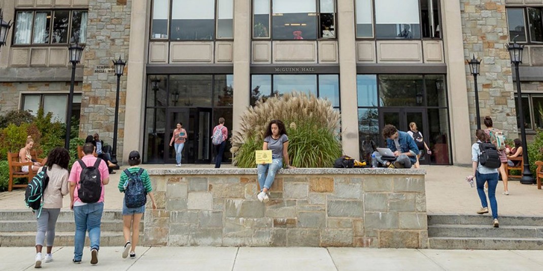 Students outside McGuinn Hall