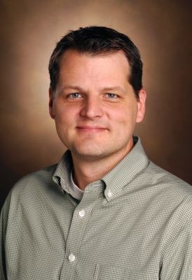 portrait of Erik W. Carter