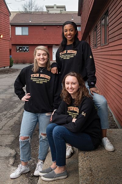 Three 6A residents wearing their Mod sweatshirts