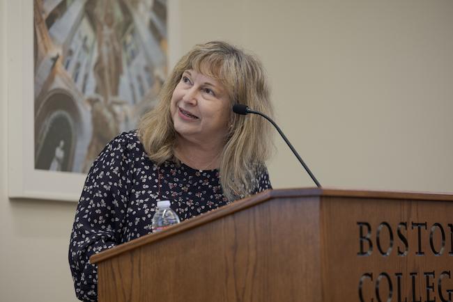 Diane Winston speaking at the podium