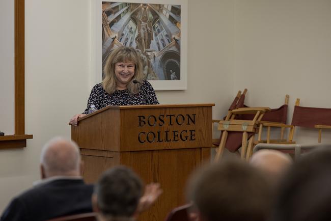 Diane Winston speaking at the podium
