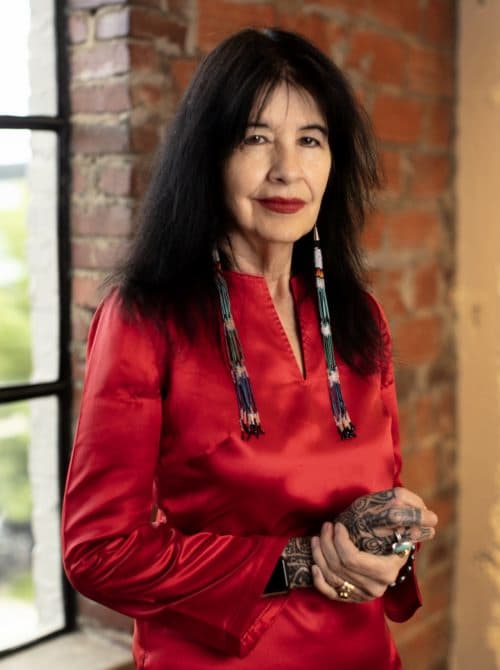 Joy Harjo Woman from the Muscogee Nation in red shirt. Photo: Matika Wilbur