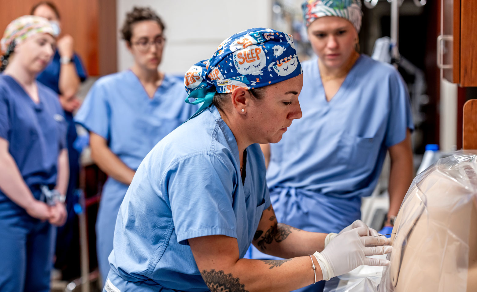 CRNA students in epidural simulation on medical manikin 