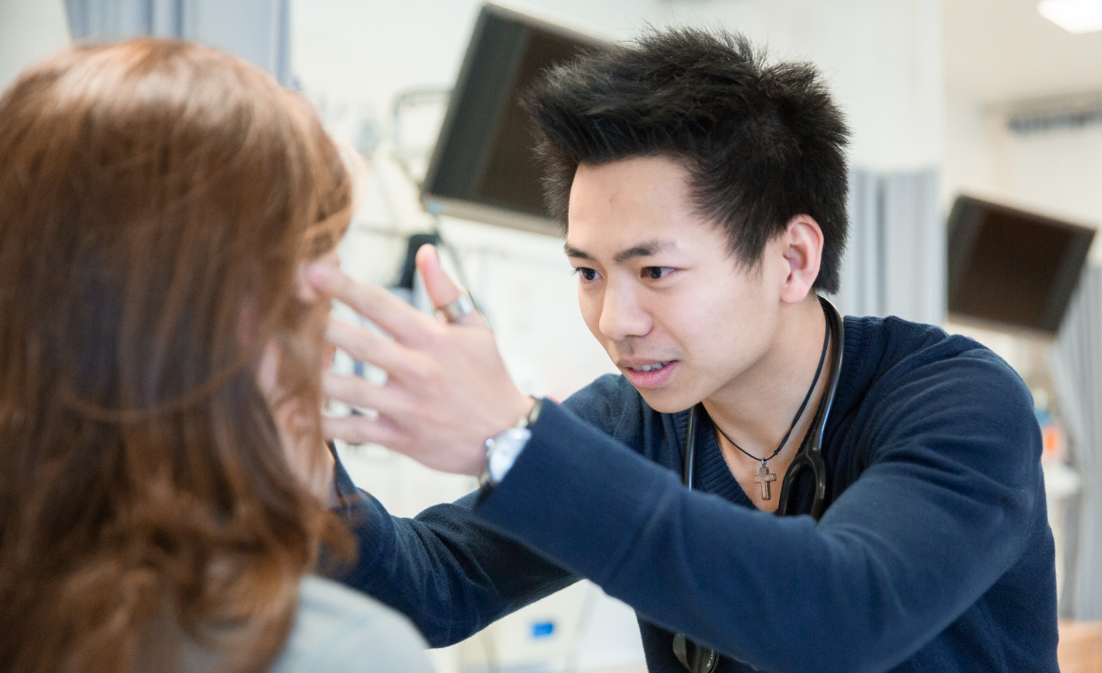 Student conducting a nursing assessment