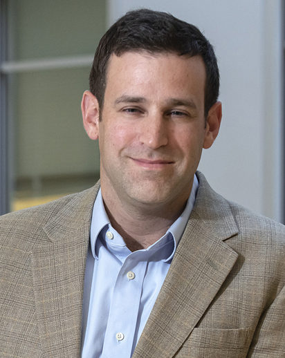 Prof. Scott Seider (LSOEHD), newly appointed facutly member photographed in the Campion Atrium for a future issue of Chronicle and the LSOEHD web site.