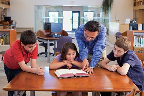 Teacher with students
