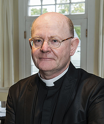 Prof. Oliver Rafferty, SJ, newly appointed faculty member (History) and the Executive Director of the Center for Irish Programs. Photographed for @bc & Chronicle. Photographed in a classroom in Stokes and in his office in Connolly House.