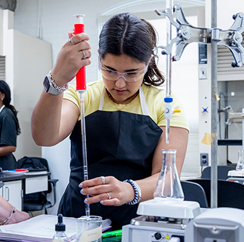 student conducting science experiment