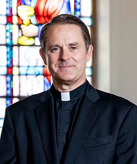 July 20, 2022 -- Boston College's Dean of the School of Theology and Ministry, Fr. Michael "Mick" McCarthy, SJ. Photographed in Simboli Hall.