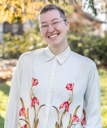 Marina Rakhilin in a button down shirt with flowers