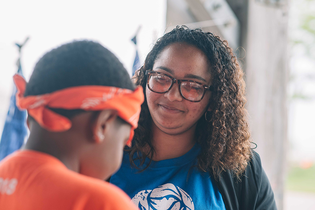 In this file photo, a BCSSW student works with a child at Camp Harbor View.