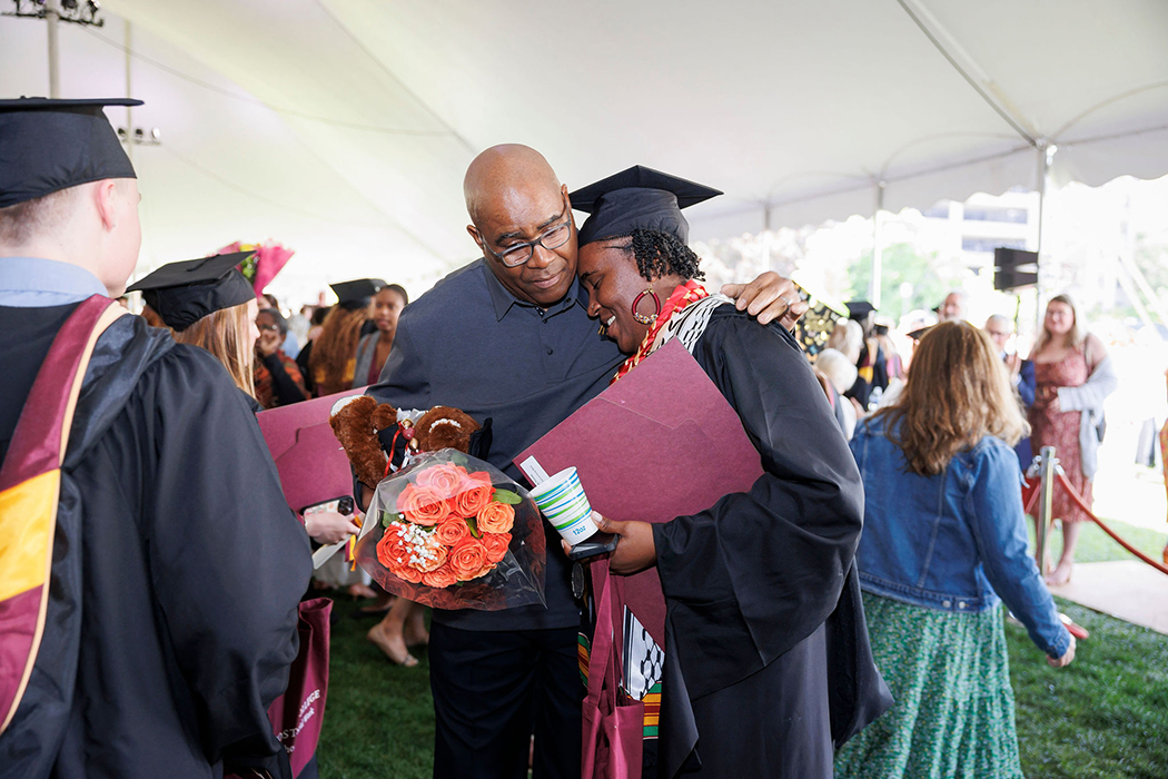 A graduate celebrates.